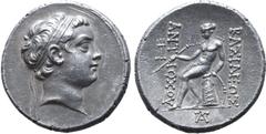 Greek Seleukid Empire, Antiochos (son of Seleukos IV) AR Tetradrachm. Antioch, circa 175 BC. Diademed head to right / Apollo Delphios seated to left on omphalos, testing arrow and resting hand on bow;