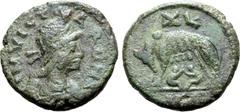 Migration Period Ostrogoths, Municipal Coinage Æ 40 Nummi. Rome, AD 526-534. INVICTA ROMA, draped bust of Roma to right, wearing crested helmet, pendant earring and necklace / She-wolf standing to lef
