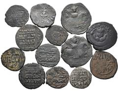 Islamic Lot of 13 Islamic Æ Coins. Includes: 1. Ayyubids, Al-Muzaffar Shihab al-Din Ghazi Æ Fals. Mayyafariqin mint, AH 617-642 = AD 1220-1245. Three-lined legend citing Caliph al-Mustasim / Similar. 