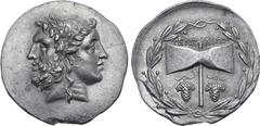 Greek Islands off Troas, Tenedos AR Tetradrachm. Circa 100-80 BC. Janiform head of a laureate bearded male to left and female to right, wearing stephanos / Labrys; TENEΔIΩN above, handle flanked by gr