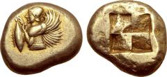 Greek Mysia, Kyzikos EL Stater. Circa 550-500 BC. Half-length bust of Kore-Persephone to left, wearing kekryphalos headdress, round earring and long-sleeved chiton, in her right hand holding a tunny f