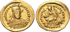 Maritime Theodosius II AV Solidus. Constantinople, AD 430-440. D N THEODOSIVS P F AVG, pearl-diademed, helmeted, draped and cuirassed bust facing slightly to right, holding spear and shield decorated 