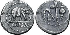 Roman Imperatorial Julius Caesar AR Denarius. Military mint travelling with Caesar, 49-48 BC. Elephant advancing to right, trampling on serpent; CAESAR in exergue / Emblems of the pontificate: simpulu