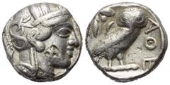 Griechische Münzen Attika. Athen. Gegengestempelte Prägungen. Tetradrachme (Silber). Ca. 454 - 404 v. Chr. Vs: Kopf der Athena mit ölzweiggeschmücktem attischem Helm, Ohranhänger und Halskette rechts.