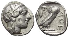 Griechische Münzen Attika. Athen. Gegengestempelte Prägungen. Tetradrachme (Silber). Ca. 454 - 404 v. Chr. Vs: Kopf der Athena mit ölzweiggeschmücktem attischem Helm, Ohranhänger und Halskette rechts.