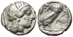 Griechische Münzen Attika. Athen. Gegengestempelte Prägungen. Tetradrachme (Silber). Ca. 454 - 404 v. Chr. Vs: Kopf der Athena mit ölzweiggeschmücktem attischem Helm, Ohranhänger und Halskette rechts.