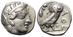 Griechische Münzen Attika. Athen. Gegengestempelte Prägungen. Tetradrachme (Silber). Ca. 454 - 404 v. Chr. Vs: Kopf der Athena mit ölzweiggeschmücktem attischem Helm, Ohranhänger und Halskette rechts.