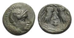Attika. Athen. Bronze. ca. 322 - 307 v. Chr. Vs: Kopf der Athen mit attischem Helm rechts. Rs: Zwei Eulen einander gegenüber stehend, den Kopf en face, im Feld dazwischen Plemochoe; das Ganze in Olive