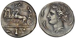 SYRACUSE. Time of Dionysios I, 405-367 B.C. Decadrachm, ca.400-390 B.C. Signed by Euainetos. Fast quadriga driven l. by female charioteer leaning forward with kentron in r. hand and reins in l. hand, 