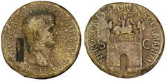 Claudius, A.D. 41-54. Æ Sestertius. Rome, A.D. 50-54. Laureate head of Claudius right; c/m: NCAPR within rectangular incuse. Rv. Arch of Nero Claudius Drusus: triumphal arch surmounted by equestrian s
