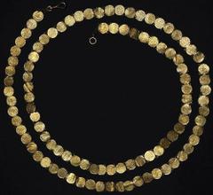 OTTOMAN EMPIRE. Mahmud II, 1808-1838, AH 1223-1255. Turkish Gold Coin Wedding Belt, ca. 1835. This amazing folk art creation is made from 100 Gold ¼ New Adli Altin coins, most from the Istanbul Mint, 